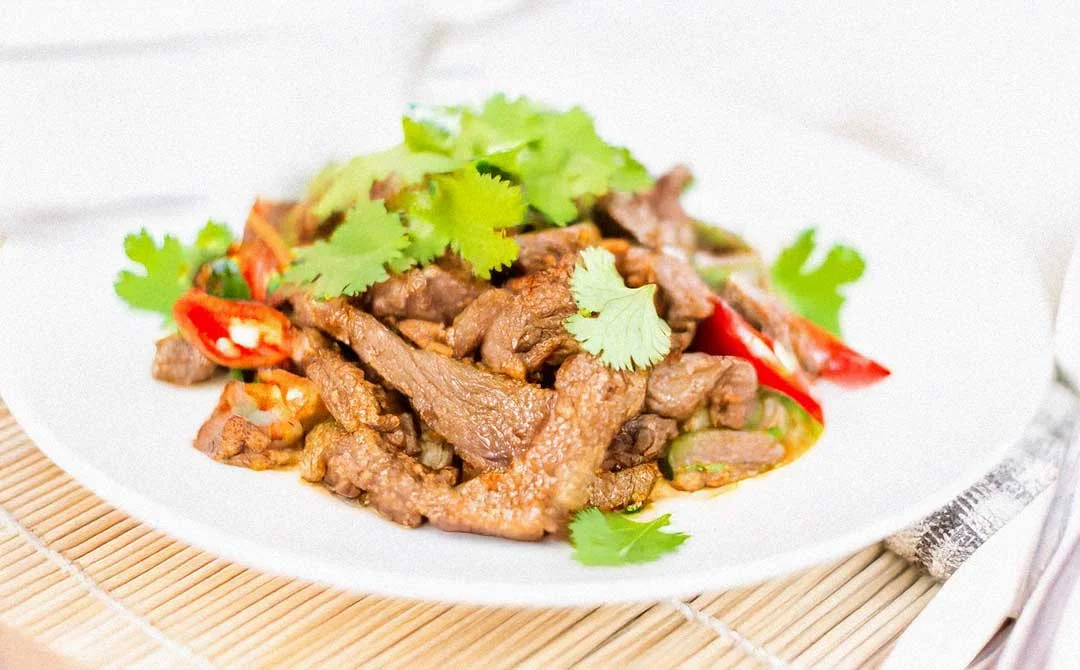 Spicy Ethnic Chilli Goat Meat Stir-Fry with vegetables
